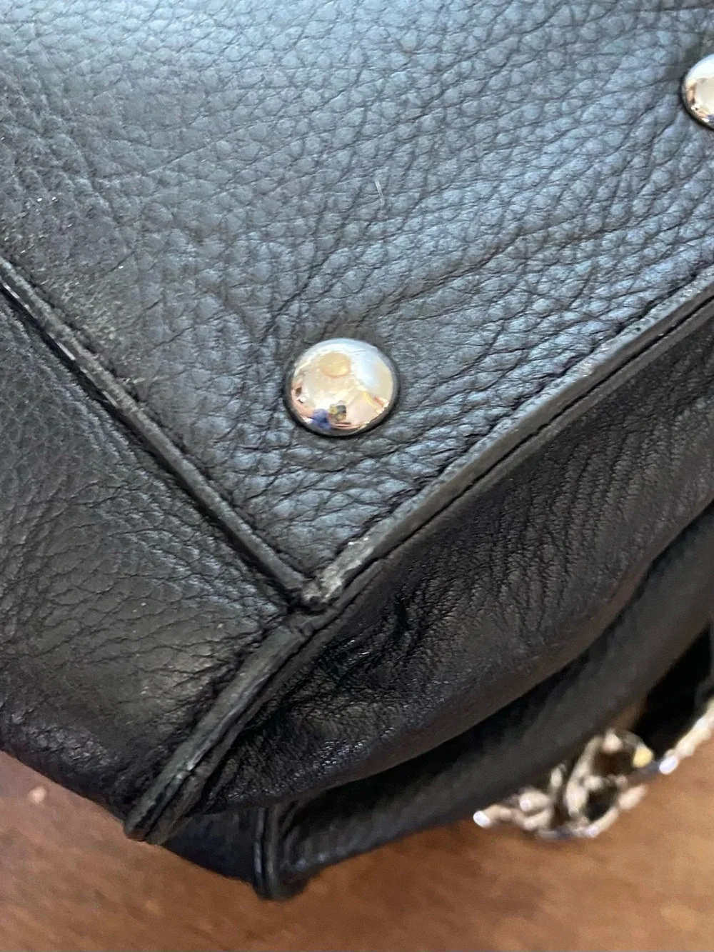 Michael Kors Black Pebbled Leather Satchel with Silver-Tone Plaque